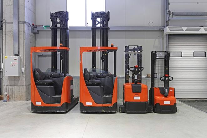 forklifts navigating through narrow aisles